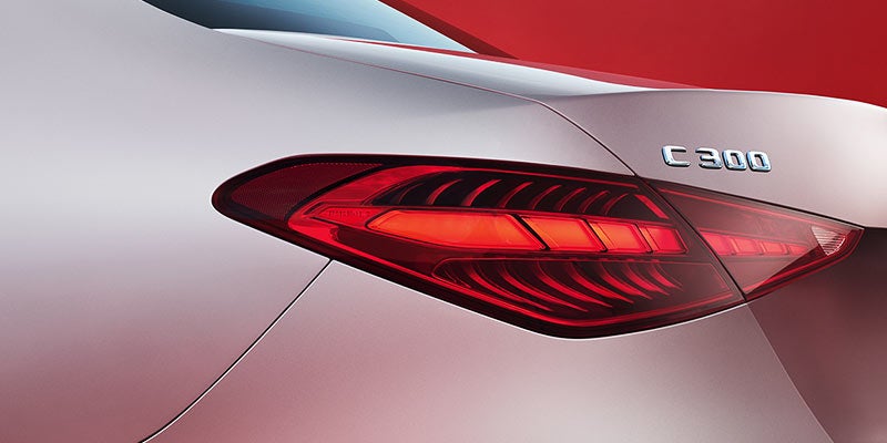 Close-up of a modern Mercedes-Benz LED taillight design.