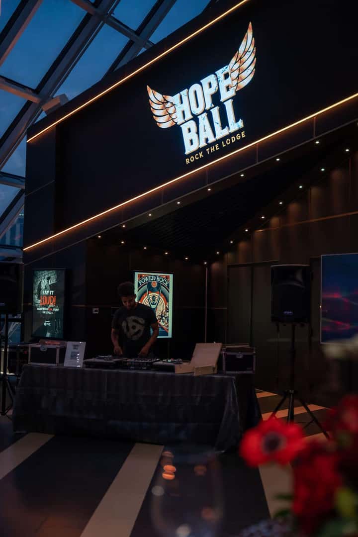 A large screen displays HOPE BALL and PRESENTING SPONSOR above Rafih Auto Group in a green box.